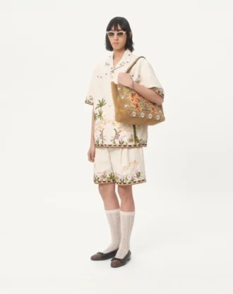 Bermudas de lona de algodón con bordados florales y ribetes jacquard