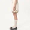 Bermudas de lona de algodón con bordados florales y ribetes jacquard Bermudas de lona de algodón con bordados florales y ribetes jacquard