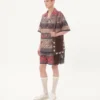 Bermudas de muselina de algodón con estampado Voyage Imaginaire y ribete de pasamanería Bermudas de muselina de algodón con estampado Voyage Imaginaire y ribete de pasamanería