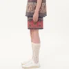 Bermudas de muselina de algodón con estampado Voyage Imaginaire y ribete de pasamanería Bermudas de muselina de algodón con estampado Voyage Imaginaire y ribete de pasamanería