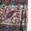 Bermudas de muselina de algodón con estampado Voyage Imaginaire y ribete de pasamanería Bermudas de muselina de algodón con estampado Voyage Imaginaire y ribete de pasamanería