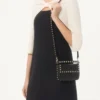 Bolsa Rockstud de piel de becerro granulada