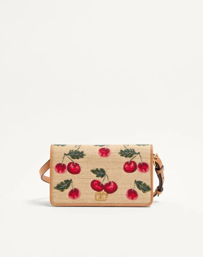 Bolso bandolera mini Vlogo Signature en rafia jacquard con estampado Cherryfic Bolso bandolera mini Vlogo Signature en rafia jacquard con estampado Cherryfic