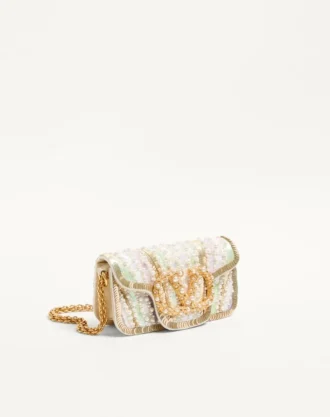 Bolso bandolera pequeño Locò de Valentino Garavani con bordado y logotipo joya