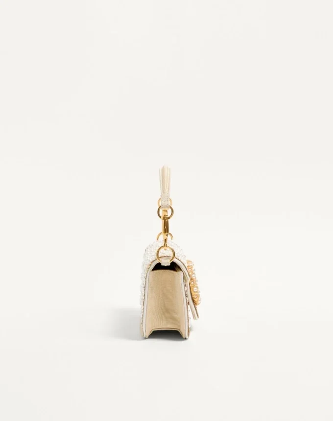 Bolso bandolera pequeño Locò de Valentino Garavani con bordado y logotipo joya Bolso bandolera pequeño Locò de Valentino Garavani con bordado y logotipo joya