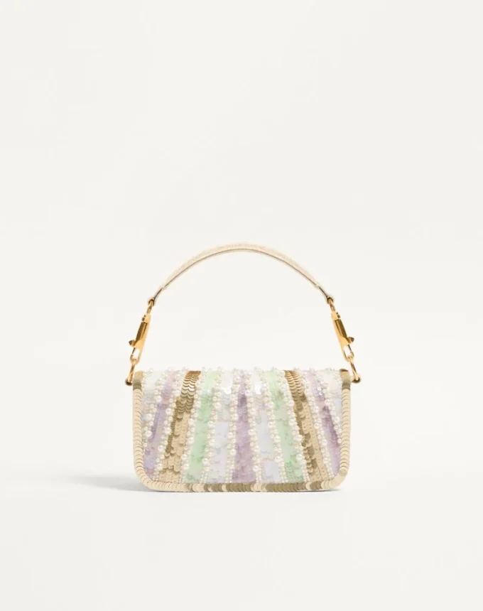 Bolso bandolera pequeño Locò de Valentino Garavani con bordado y logotipo joya Bolso bandolera pequeño Locò de Valentino Garavani con bordado y logotipo joya