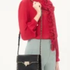 Bolso bandolera pequeño Rockstud de piel de becerro granulada