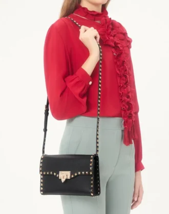 Bolso bandolera pequeño Rockstud de piel de becerro granulada