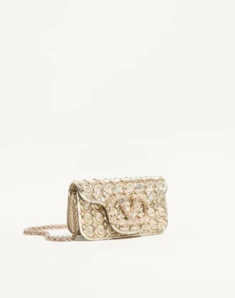 Bolso bandolera pequeño Valentino Garavani Locò con logotipo bordado con joyas