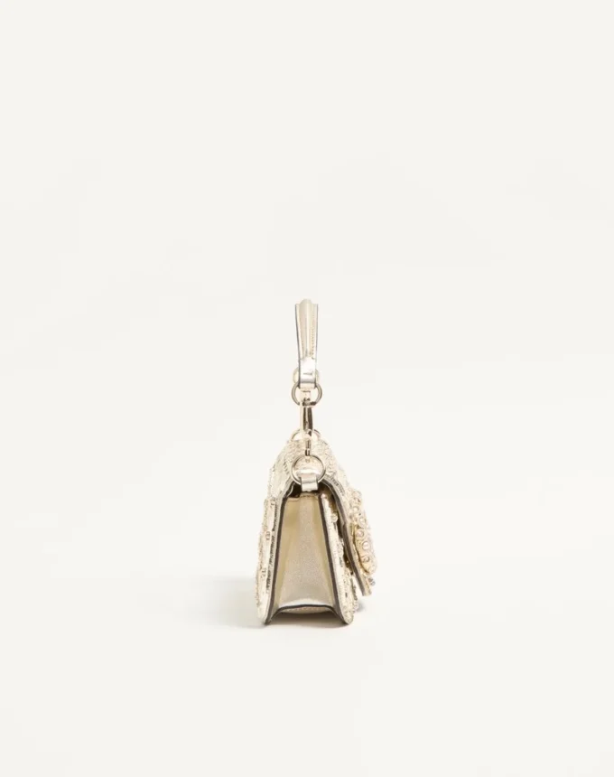 Bolso bandolera pequeño Valentino Garavani Locò con logotipo bordado con joyas Bolso bandolera pequeño Valentino Garavani Locò con logotipo bordado con joyas
