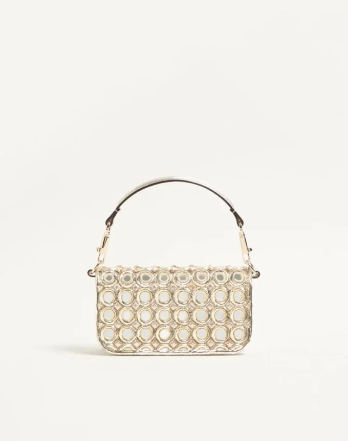 Bolso bandolera pequeño Valentino Garavani Locò con logotipo bordado con joyas Bolso bandolera pequeño Valentino Garavani Locò con logotipo bordado con joyas