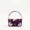 Bolso bandolera pequeño Valentino Garavani Locò con logotipo bordado con joyas Bolso bandolera pequeño Valentino Garavani Locò con logotipo bordado con joyas