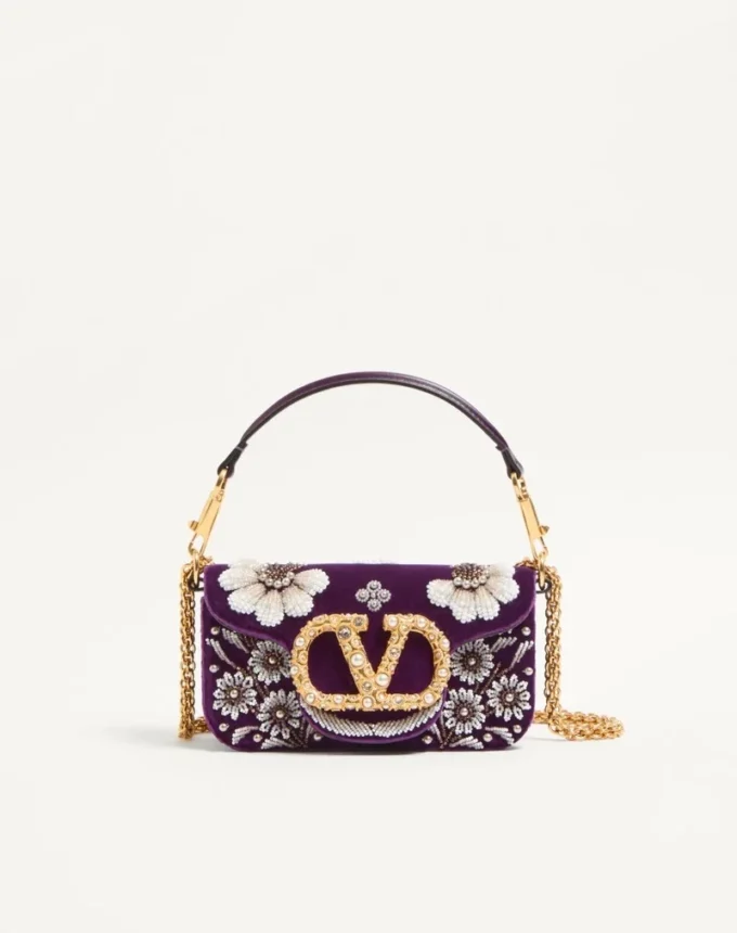 Bolso bandolera pequeño Valentino Garavani Locò con logotipo bordado con joyas Bolso bandolera pequeño Valentino Garavani Locò con logotipo bordado con joyas