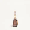 Bolso bandolera pequeño Valentino Garavani Locò en piel de becerro laminada con logotipo joya Bolso bandolera pequeño Valentino Garavani Locò en piel de becerro laminada con logotipo joya