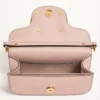 Bolso bandolera pequeño Valentino Garavani Locò en piel de becerro laminada con logotipo joya Bolso bandolera pequeño Valentino Garavani Locò en piel de becerro laminada con logotipo joya