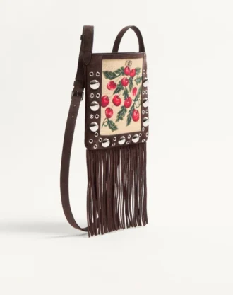 Bolso bandolera pequeño Valentino Garavani Nellcôte en rafia jacquard con estampado Cherryfic