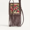 Bolso bandolera pequeño Valentino Garavani Nellcôte en rafia jacquard con estampado Cherryfic Bolso bandolera pequeño Valentino Garavani Nellcôte en rafia jacquard con estampado Cherryfic