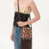 Bolso bandolera pequeño Valentino Garavani Nellcôte en rafia jacquard con estampado Cherryfic Bolso bandolera pequeño Valentino Garavani Nellcôte en rafia jacquard con estampado Cherryfic