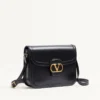 Bolso bandolera Valentino Garavani 9To5 de piel de becerro lisa Bolso bandolera Valentino Garavani 9To5 de piel de becerro lisa