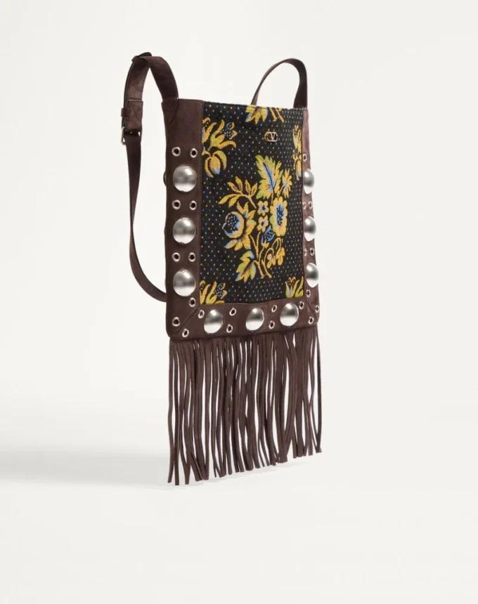 Bolso bandolera Valentino Garavani Nellcôte en tejido jacquard con flecos Bolso bandolera Valentino Garavani Nellcôte en tejido jacquard con flecos