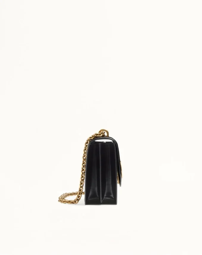 Bolso de hombro Valentino Garavani Vain en piel de becerro brillante Bolso de hombro Valentino Garavani Vain en piel de becerro brillante