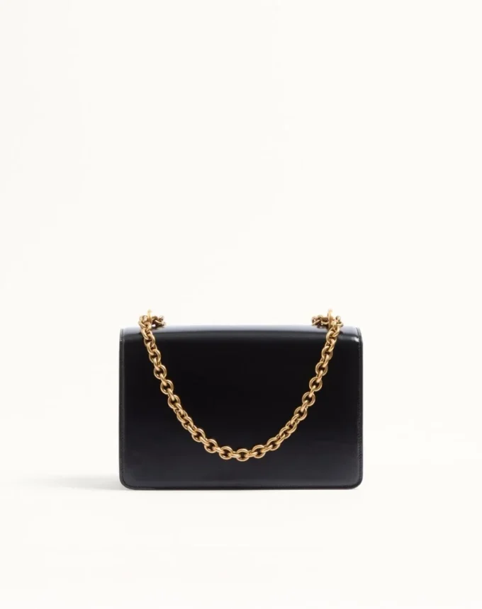 Bolso de hombro Valentino Garavani Vain en piel de becerro brillante Bolso de hombro Valentino Garavani Vain en piel de becerro brillante