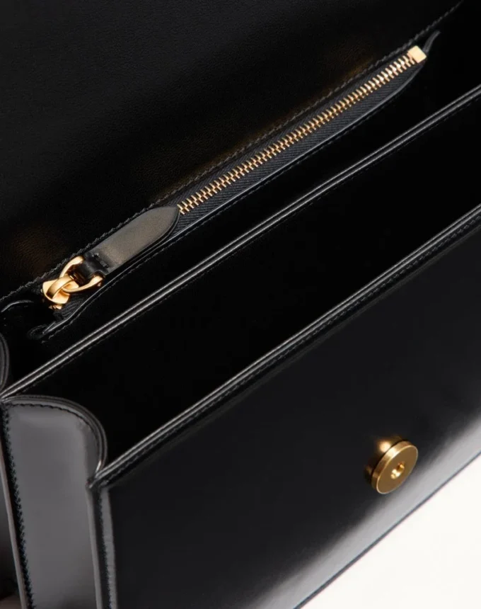 Bolso de hombro Valentino Garavani Vain en piel de becerro brillante Bolso de hombro Valentino Garavani Vain en piel de becerro brillante