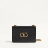 Bolso de hombro Valentino Garavani Vain en piel de becerro brillante Bolso de hombro Valentino Garavani Vain en piel de becerro brillante