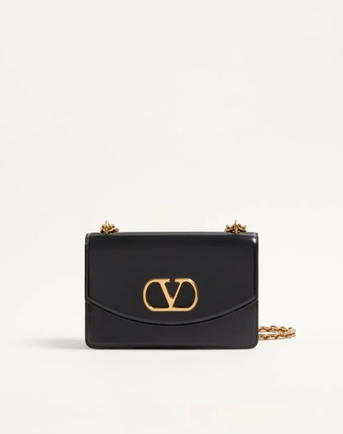 Bolso de hombro Valentino Garavani Vain en piel de becerro brillante Bolso de hombro Valentino Garavani Vain en piel de becerro brillante