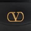 Bolso de hombro Valentino Garavani Vain en piel de becerro brillante Bolso de hombro Valentino Garavani Vain en piel de becerro brillante