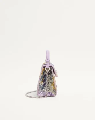 Bolso de mano mini Valentino Garavani Vsling con motivo Flowerism de pedrería y logotipo joya