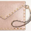 Bolso de mano Rockstud de piel de becerro granulada laminada Bolso de mano Rockstud de piel de becerro granulada laminada