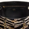 Bolso de mano Valentino Garavani Laseine en pitón y ante con estampado en forma de chevron