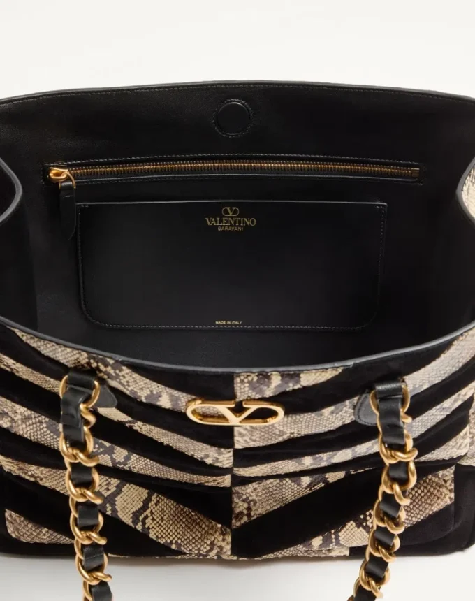 Bolso de mano Valentino Garavani Laseine en pitón y ante con estampado en forma de chevron
