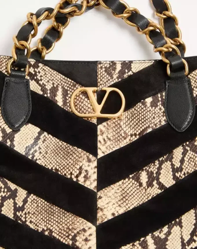 Bolso de mano Valentino Garavani Laseine en pitón y ante con estampado en forma de chevron
