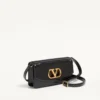 Bolso de mano Valentino Garavani Vain en piel de becerro brillante Bolso de mano Valentino Garavani Vain en piel de becerro brillante