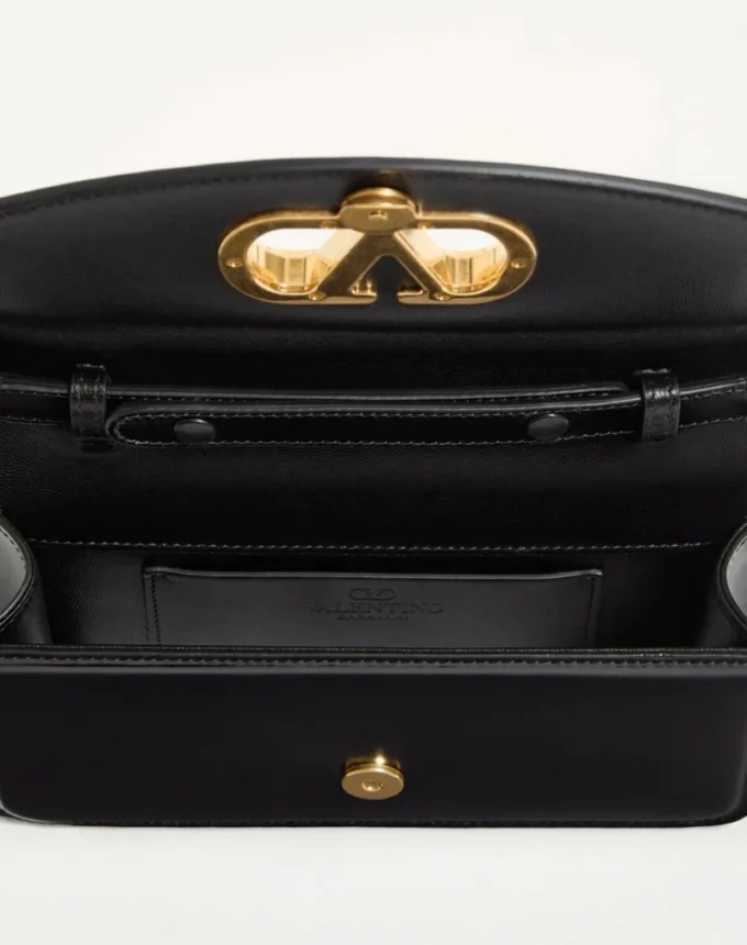 Bolso de mano Valentino Garavani Vain en piel de becerro brillante Bolso de mano Valentino Garavani Vain en piel de becerro brillante