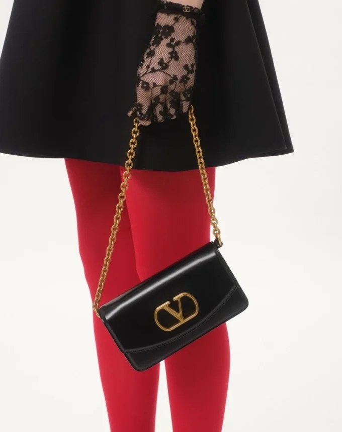 Bolso de mano Valentino Garavani Vain en piel de becerro brillante Bolso de mano Valentino Garavani Vain en piel de becerro brillante