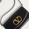 Bolso de mano Valentino Garavani Vain en piel de becerro brillante Bolso de mano Valentino Garavani Vain en piel de becerro brillante