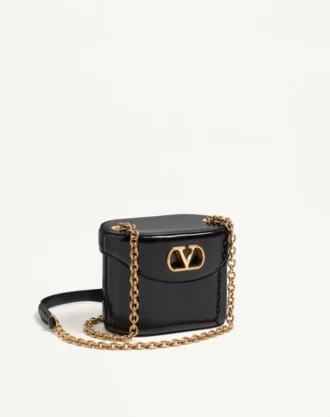 Bolso de tocador Valentino Garavani Vain en piel de becerro brillante