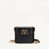 Bolso de tocador Valentino Garavani Vain en piel de becerro brillante Bolso de tocador Valentino Garavani Vain en piel de becerro brillante