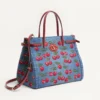 Bolso mediano Antibes de Valentino Garavani en denim con bordado Cherryfic