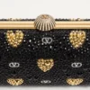 Bolso minaudière Carry Secrets con motivo Cour de Cœur de pedrería