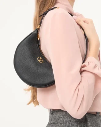 Bolso mini hobo Vlogo Signature en piel de becerro granulada
