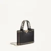 Bolso mini shopping Rockstud en piel de becerro granulada Bolso mini shopping Rockstud en piel de becerro granulada
