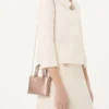 Bolso mini shopping Rockstud en piel de becerro granulada laminada