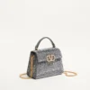 Bolso mini Vsling de Valentino Garavani con pedrería y logotipo joya Bolso mini Vsling de Valentino Garavani con pedrería y logotipo joya