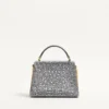 Bolso mini Vsling de Valentino Garavani con pedrería y logotipo joya Bolso mini Vsling de Valentino Garavani con pedrería y logotipo joya