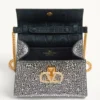 Bolso mini Vsling de Valentino Garavani con pedrería y logotipo joya Bolso mini Vsling de Valentino Garavani con pedrería y logotipo joya