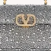 Bolso mini Vsling de Valentino Garavani con pedrería y logotipo joya Bolso mini Vsling de Valentino Garavani con pedrería y logotipo joya